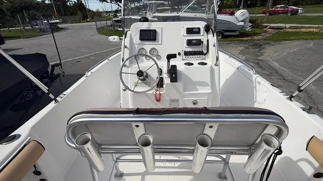 Slide: The Image of The image shows the cockpit of a 2007 Pro-Line Sport Series 20 boat with a helm console and seating. - 17