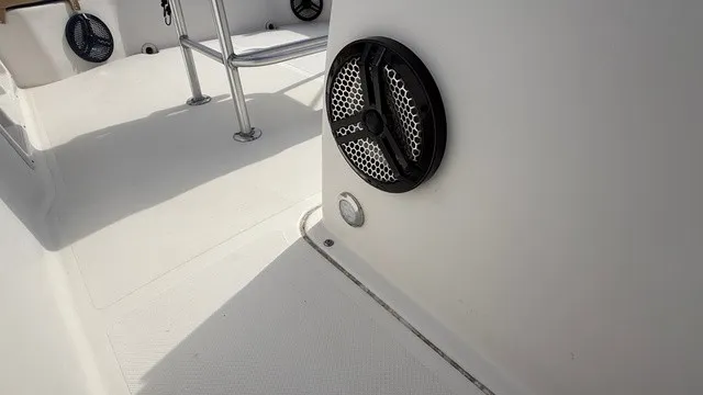 Slide: The Image of Close-up of a 2007 Pro-Line SPORT SERIES 20 boat deck with a speaker. - 12