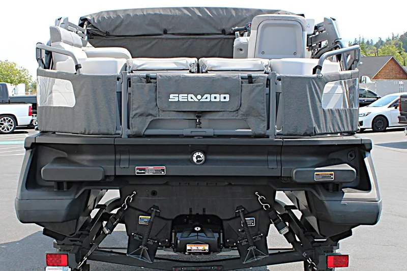 Slide: The Image of 2023 Sea-Doo Switch Sport Compact rear view, showcasing seating and storage features. - 19