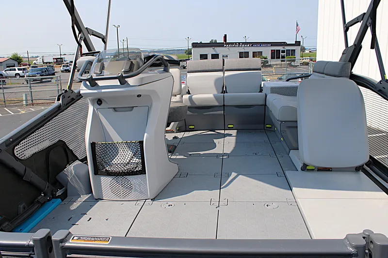 Slide: The Image of 2023 Sea-Doo Switch Sport Compact interior with seating and steering console. - 20