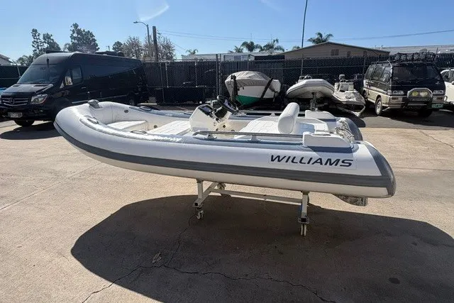 The Image of 2018 Williams Jet Tenders Sportjet 395 boat displayed outdoors on a sunny day. - 0