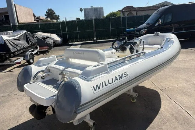 Slide: The Image of 2018 Williams Jet Tenders Sportjet 395 on trailer, parked outdoors. - 4