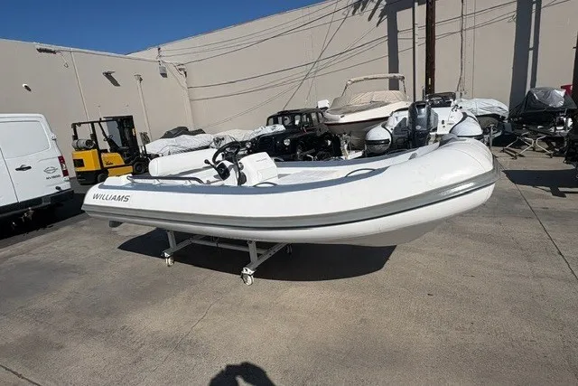 Slide: The Image of 2018 Williams Jet Tenders Sportjet 395 in a storage yard, ready for use. - 2
