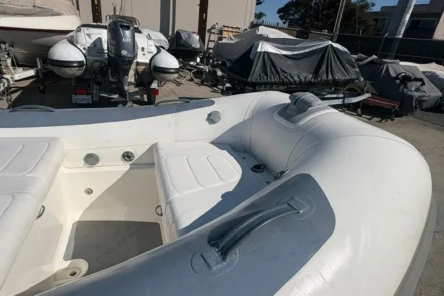 Slide: The Image of 2018 Williams Jet Tenders Sportjet 395 inflatable boat in storage yard. - 8
