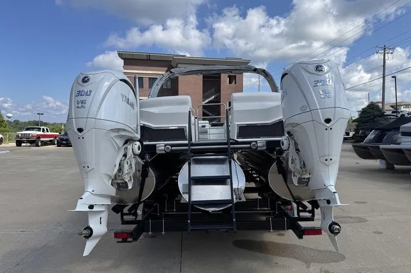 Slide: The Image of 2024 Bennington 30 QXFBAX2 boat with dual Yamaha 300 V6 outboard engines. - 4