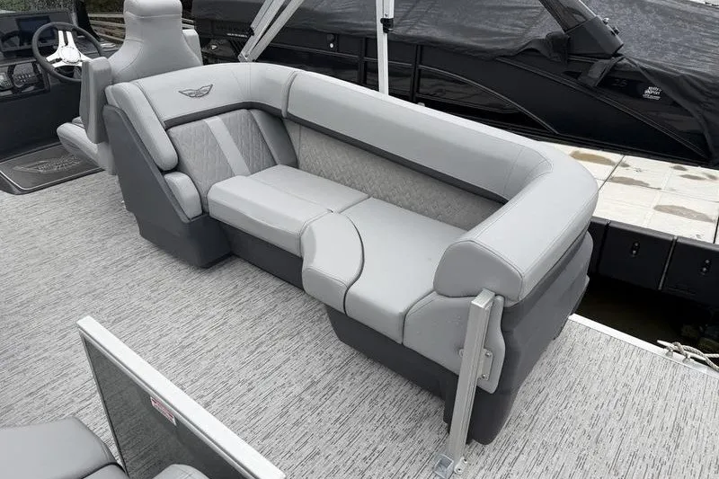 Slide: The Image of 2025 Bennington 24 MFB pontoon boat with luxurious gray seating and modern design. - 7
