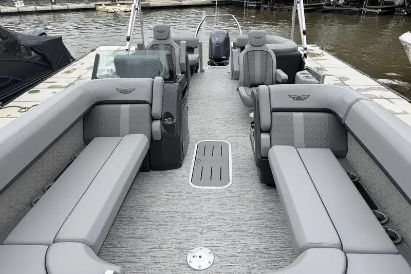 Slide: The Image of 2025 Bennington 24 MFB pontoon boat with luxurious gray seating and spacious layout. - 15