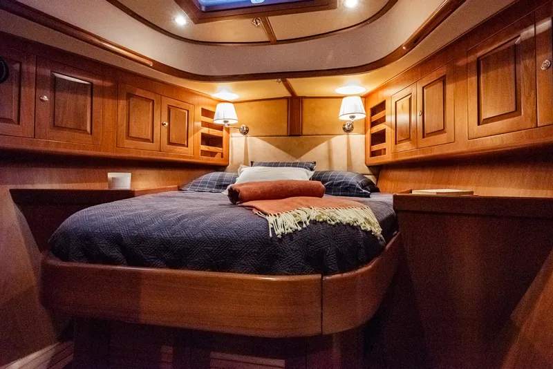 Slide: The Image of Luxurious cabin interior of a 2011 Hylas 56 yacht with wooden finishes. - 30