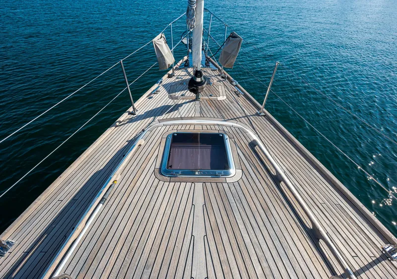 Slide: The Image of Deck view of 2011 Hylas 56 yacht on calm blue water. - 14
