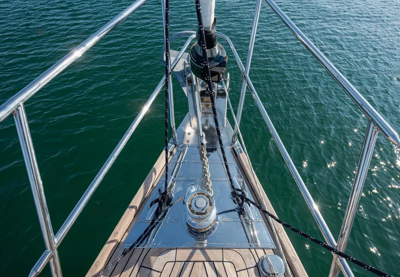 Slide: The Image of Bow of 2011 Hylas 56 yacht with polished deck and railing. - 15
