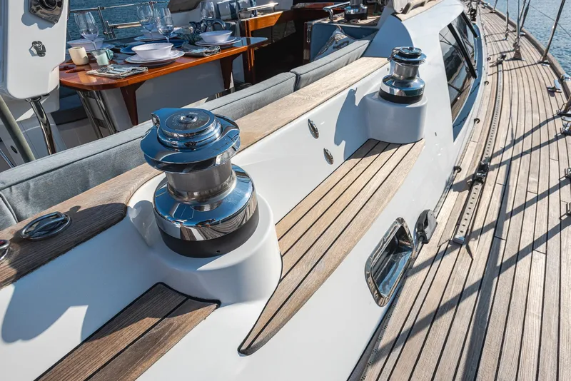 Slide: The Image of Luxurious 2011 Hylas 56 yacht deck with polished winches and elegant wood finish. - 10