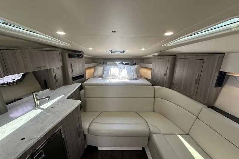 Slide: The Image of Luxurious interior of 2019 Regal 35 Sport Coupe with modern furnishings and elegant design. - 12