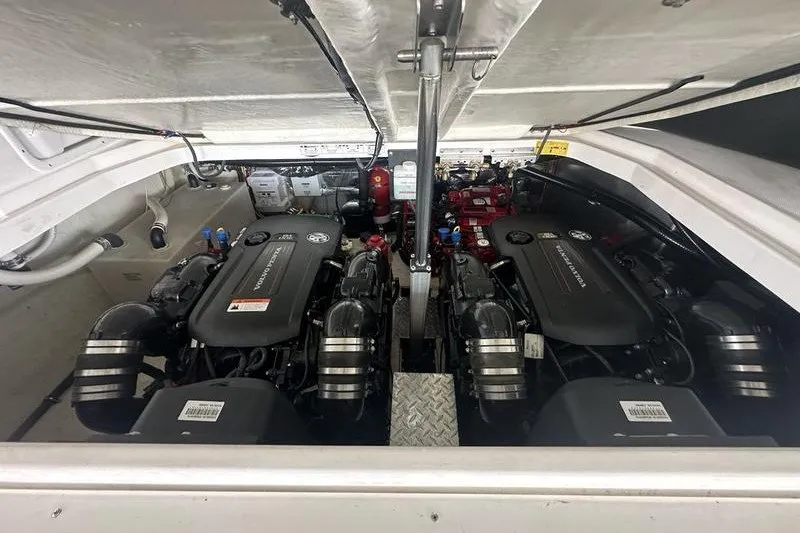Slide: The Image of Engine compartment of a 2019 Regal 35 Sport Coupe, showcasing dual powerful engines. - 19
