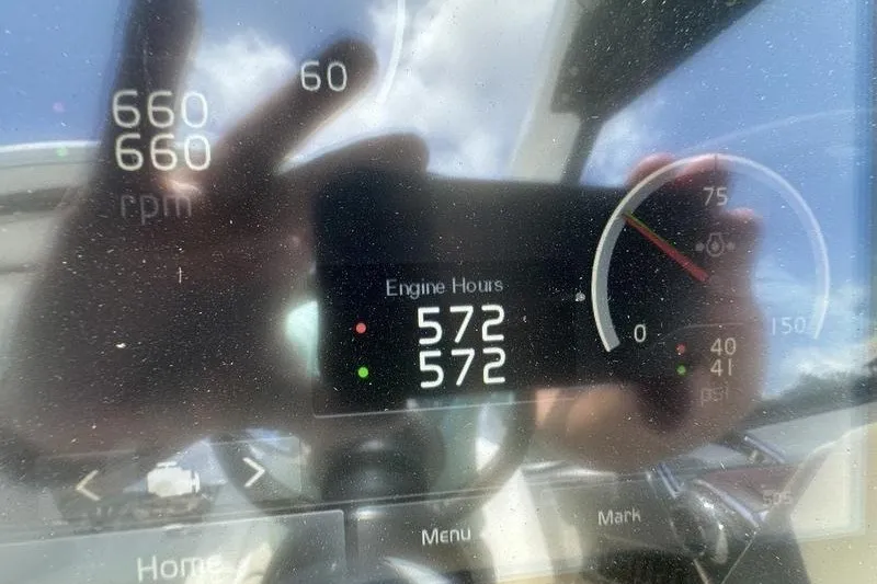 Slide: The Image of Dashboard display of a 2019 Regal 35 Sport Coupe showing engine hours and RPM. - 18