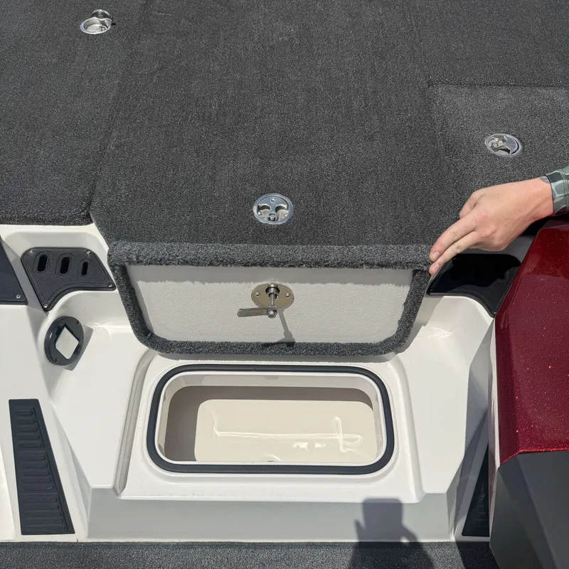 Slide: The Image of A 2019 Ranger Z518 with an open storage compartment on the deck. - 25