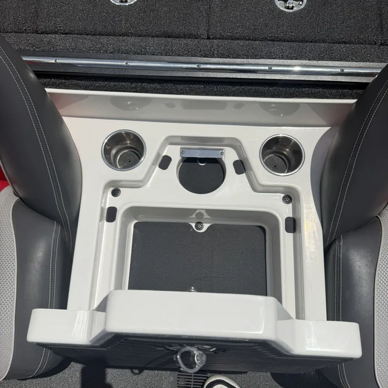 Slide: The Image of The image shows the interior of a 2019 Ranger Z518 boat with cup holders and storage space. - 21