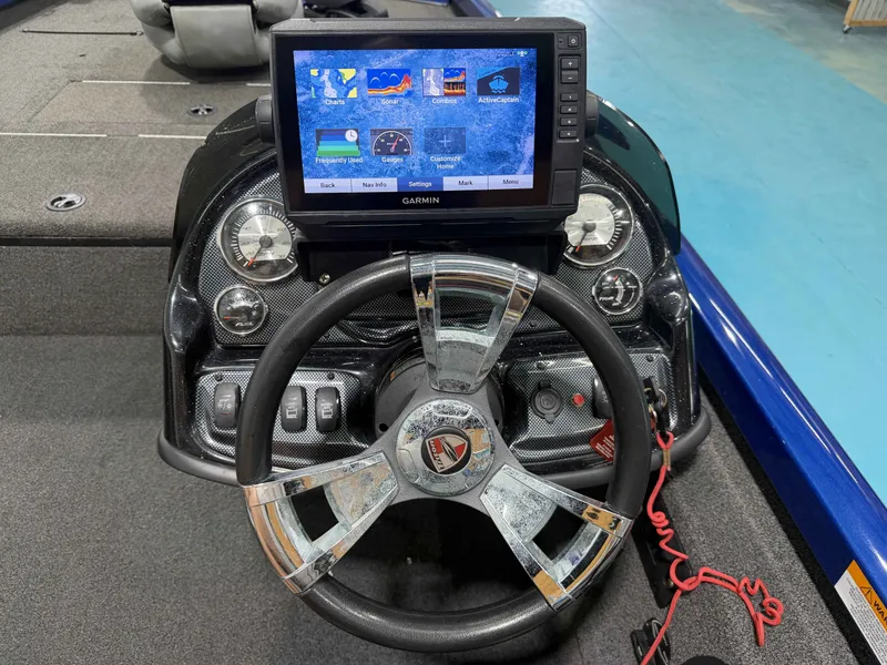 Slide: The Image of The image shows the cockpit of a 2017 Triton 18CTX with a Garmin display and stylish steering wheel. - 11