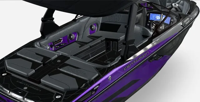 Slide: The Image of The image shows a modern Centurion Ri230 boat from 2027 with purple and black accents. - 8