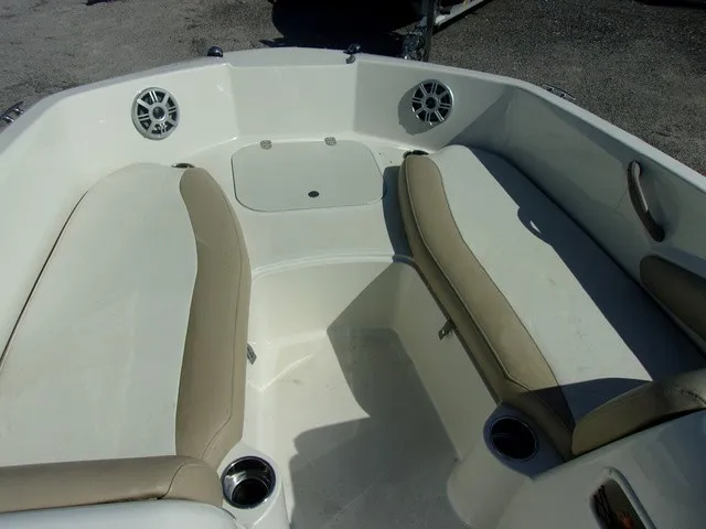 Slide: The Image of The image shows the bow area of a 2017 Stingray 182 SC with cushioned seats and speakers. - 11