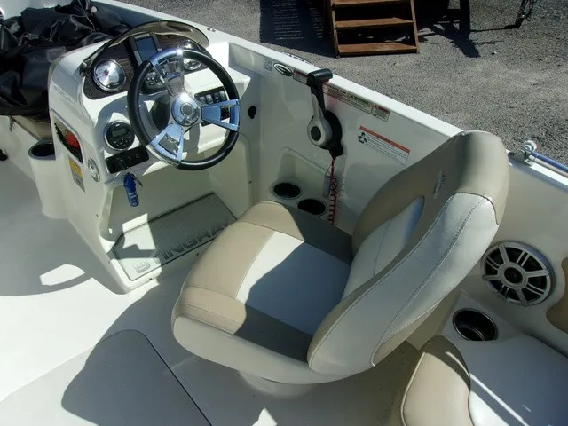 Slide: The Image of The image shows the cockpit of a 2017 Stingray 182 SC with a beige and white seat. - 8