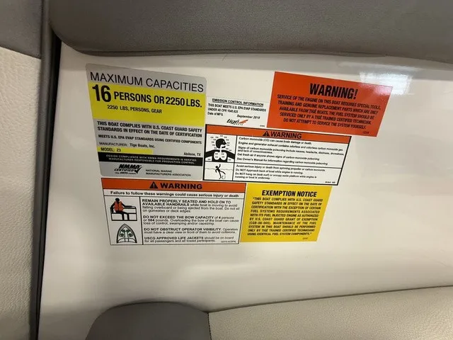 Slide: The Image of Warning labels and capacity details for a boat, accommodating up to 16 people or 2250 pounds. - 18