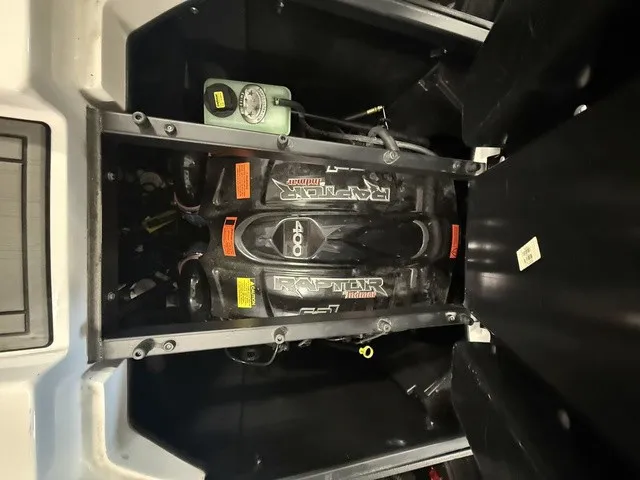 Slide: The Image of The engine compartment of a 2017 Tigé Z3 boat features a Raptor 400 engine. - 29