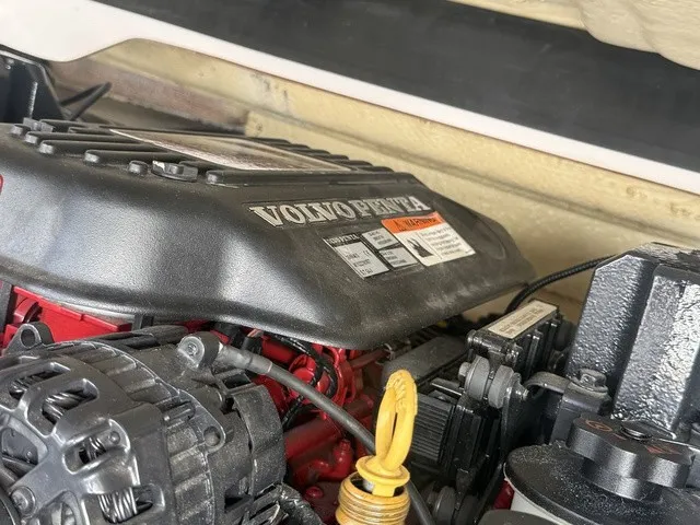 Slide: The Image of Close-up of a Volvo Penta engine in a 2008 Four Winns H220 boat. - 35