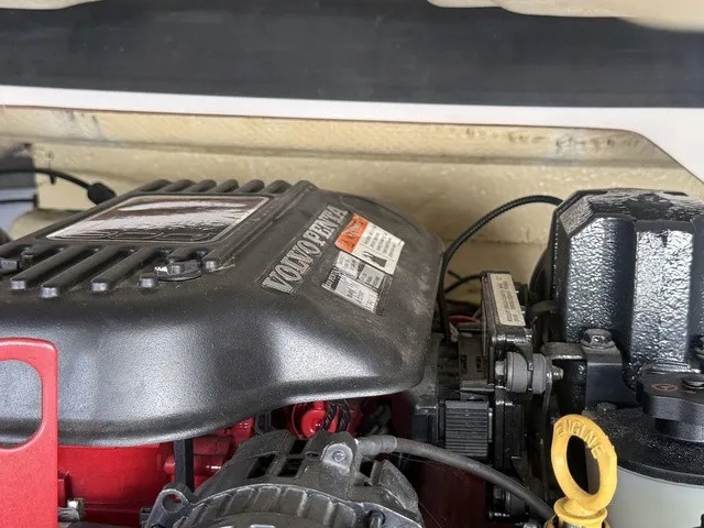 Slide: The Image of Engine compartment of a 2008 Four Winns H220 with a Volvo Penta engine. - 33
