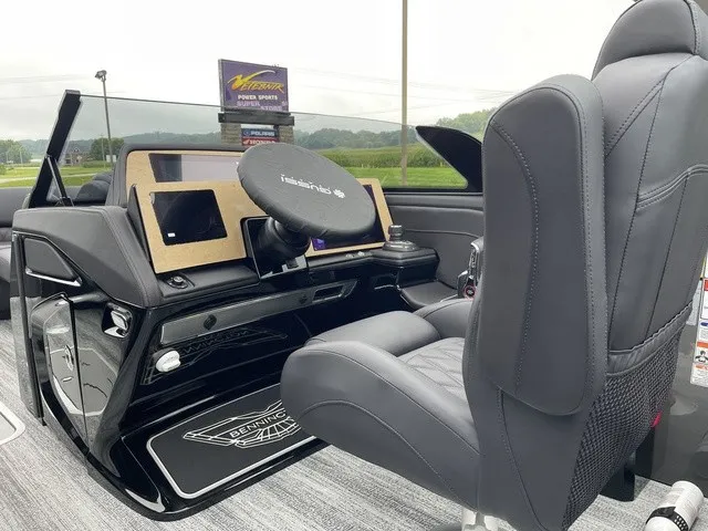 Slide: The Image of The image shows the cockpit of a 2026 Bennington QX Swingback 27 QXSBWAT2 with modern controls. - 22
