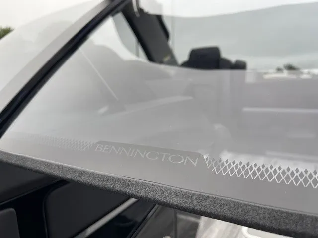 Slide: The Image of Close-up of a Bennington boat focusing on the windshield design. - 18