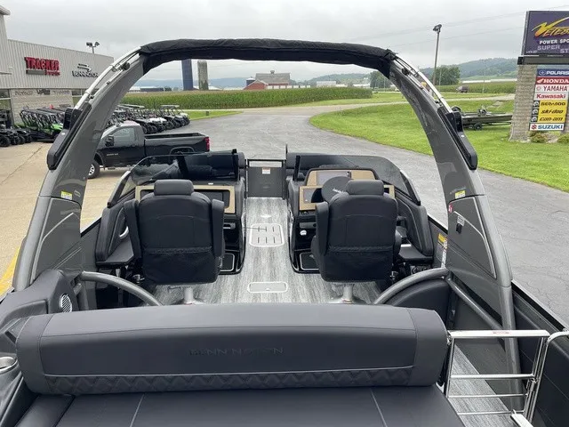 Slide: The Image of The image shows the interior of a 2026 Bennington QX Swingback 27 QXSBWAT2 boat with luxurious seating. - 36
