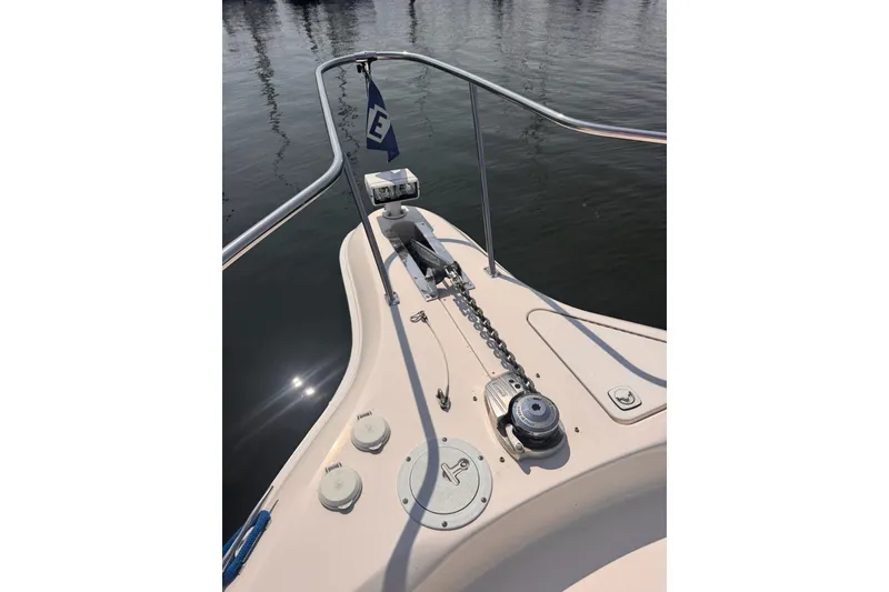 Slide: The Image of Bow of a 1997 Sea Ray 450 Sundancer with anchor chain and railing. - 4