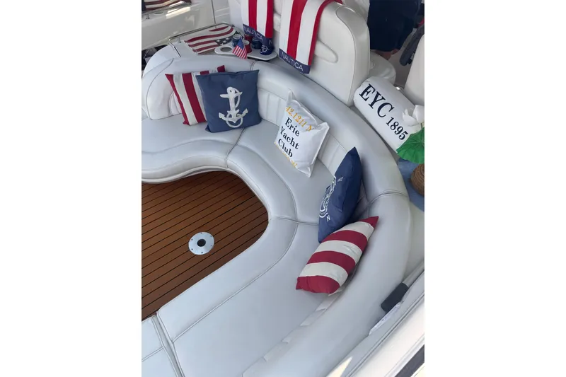 Slide: The Image of Luxurious 1997 Sea Ray 450 Sundancer yacht interior with nautical-themed cushions. - 11