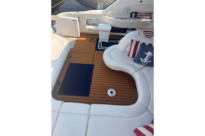 Slide: The Image of Luxurious 1997 Sea Ray 450 Sundancer yacht interior with elegant seating and nautical decor. - 10
