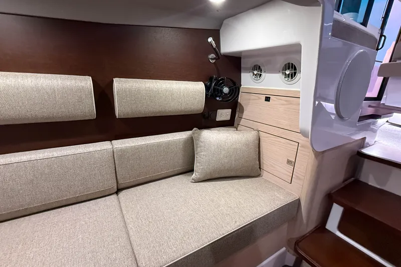 Slide: The Image of Luxurious interior of 2024 Axopar 45 XC Cross Cabin with comfortable seating and modern design. - 27