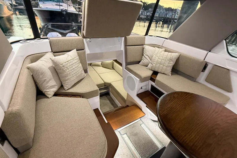 Slide: The Image of Luxurious interior of 2024 Axopar 45 XC Cross Cabin with plush seating and elegant design. - 21