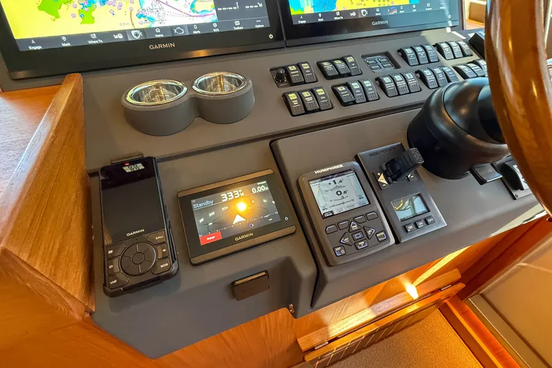 Slide: The Image of Control panel of 2026 Targa 41 boat with Garmin navigation systems. - 33