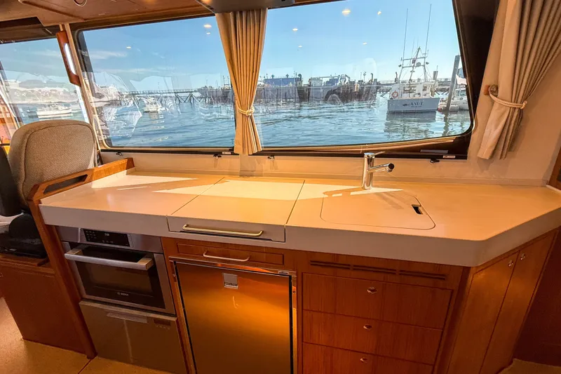 Slide: The Image of Modern kitchen interior of 2026 Targa 41 yacht with ocean view. - 22
