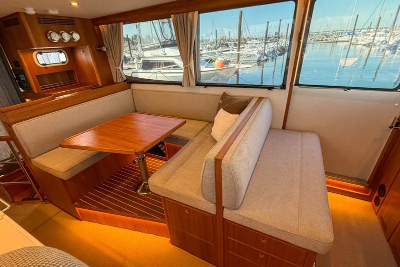 Slide: The Image of Luxurious interior of 2026 Targa 41 yacht with elegant seating and marina view. - 27