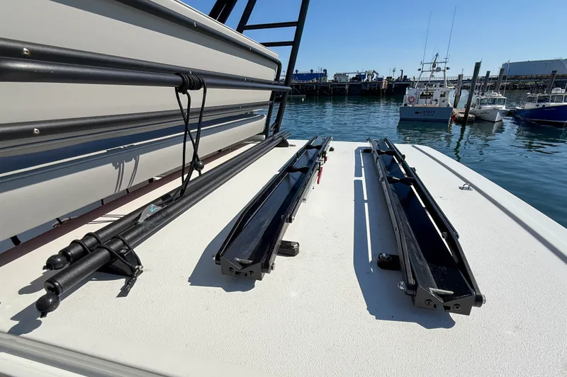 Slide: The Image of 2026 Targa 41 boat deck with mounted equipment, docked at a marina. - 18
