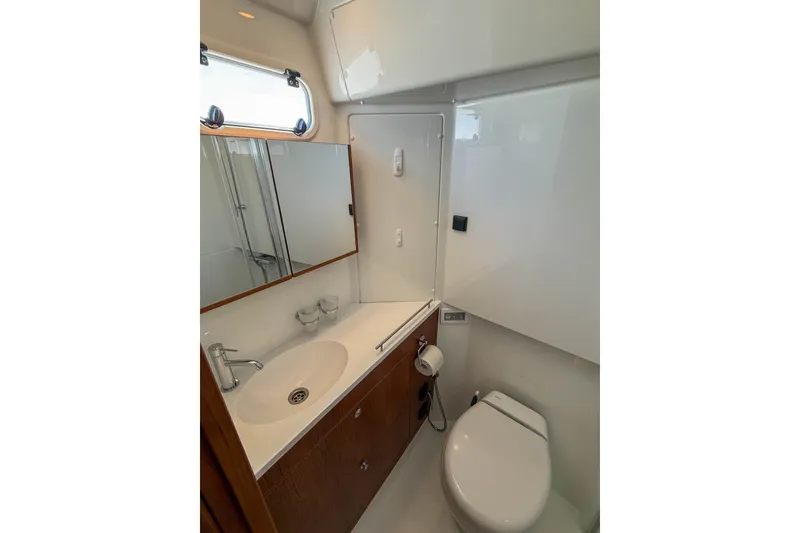 Slide: The Image of Modern bathroom in 2026 Targa 41 yacht with sleek fixtures and ample storage. - 41