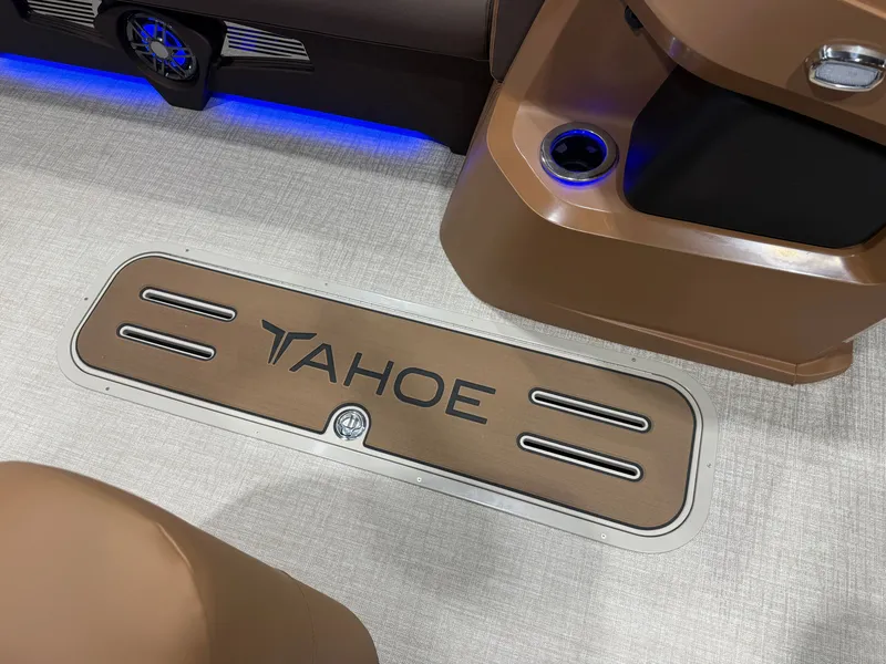 Slide: The Image of The floor of a Tahoe boat with an inset logo and blue LED lighting. - 31