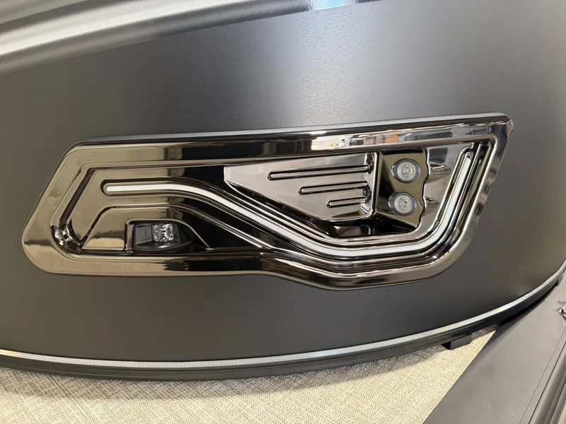 Slide: The Image of Close-up of a modern boat light with a sleek chrome design. - 38