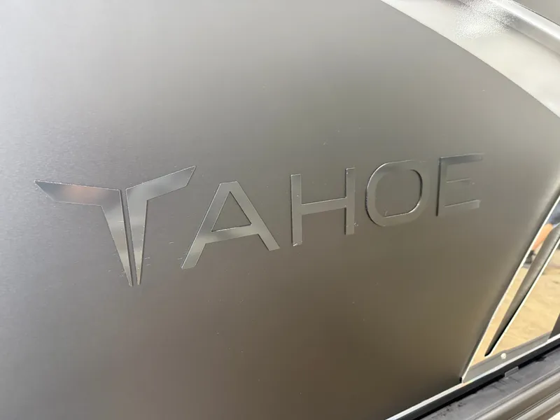 Slide: The Image of Close-up of the Tahoe logo on a boat. - 41