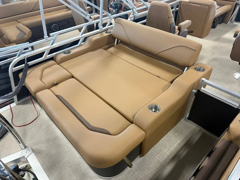 Slide: The Image of The image shows a luxurious beige lounge area on a boat with stainless steel railing. - 20