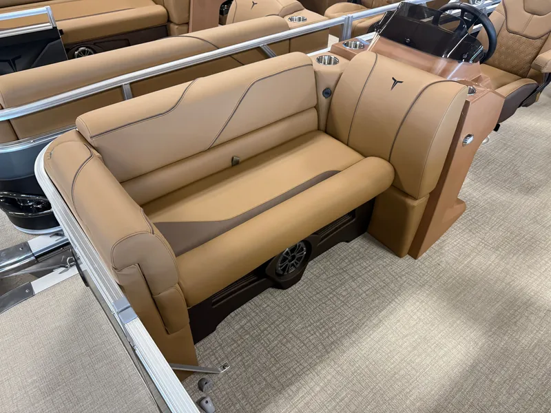 Slide: The Image of Luxurious beige leather seating on a modern boat with sleek armrests and built-in speaker. - 8