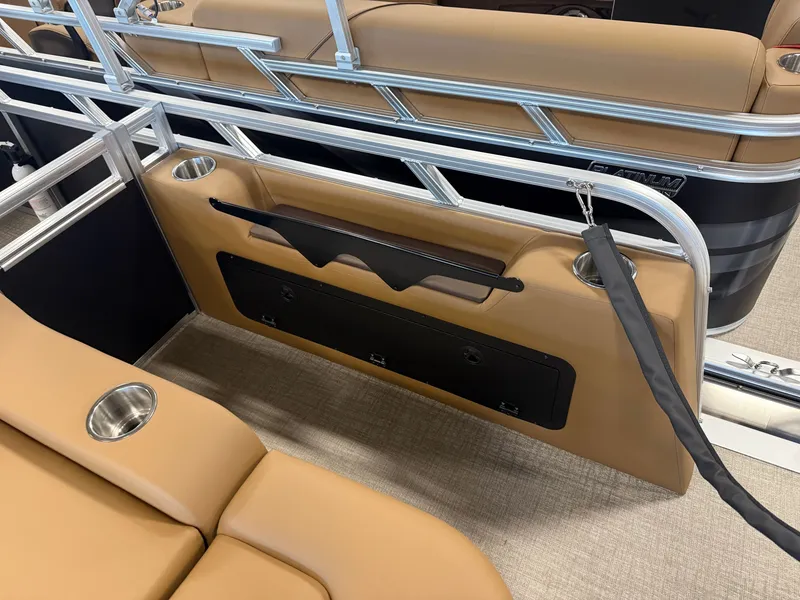 Slide: The Image of The image shows the interior of a boat with beige upholstery and stainless steel railings. - 23