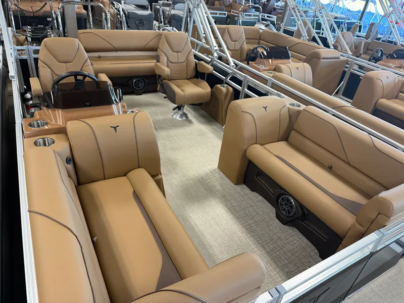 Slide: The Image of Luxurious interior of a 2027 Tahoe Sport VRB 2180 Swingback with beige leather seating and modern design. - 32