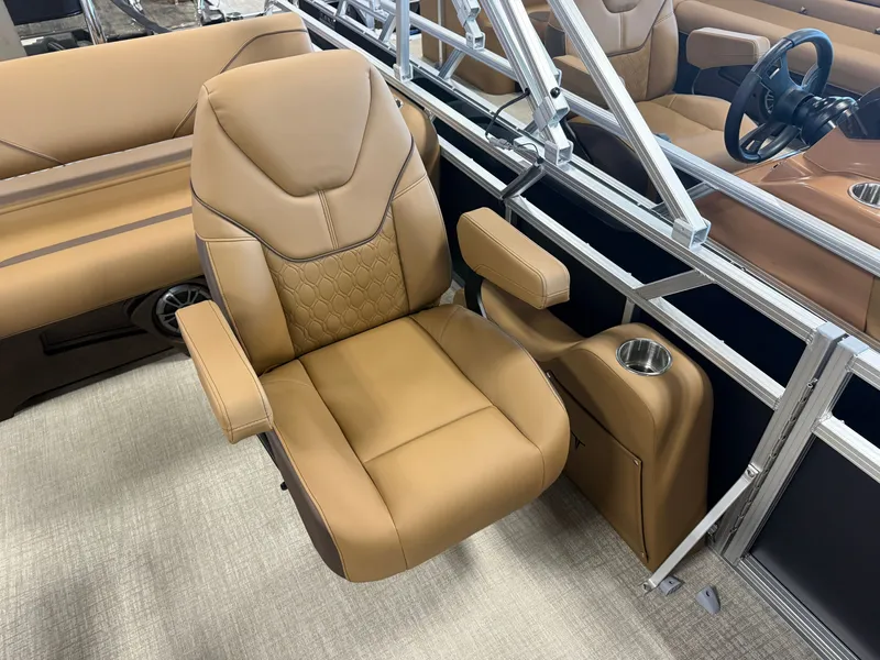 Slide: The Image of Luxurious beige seat with armrest and cup holder in a modern boat. - 10