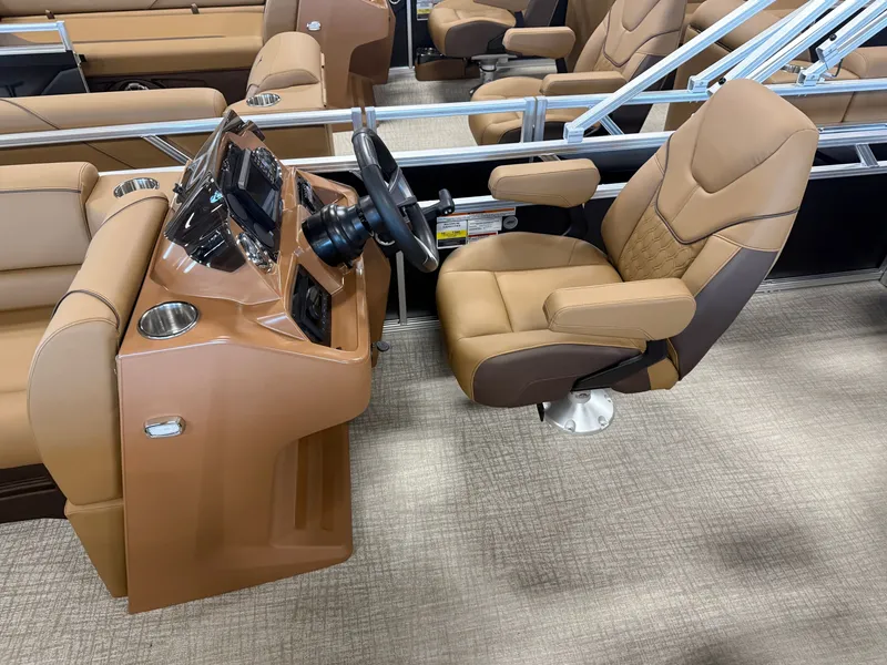 Slide: The Image of The image shows the helm of a modern boat with a comfortable, swiveling captain's chair. - 11